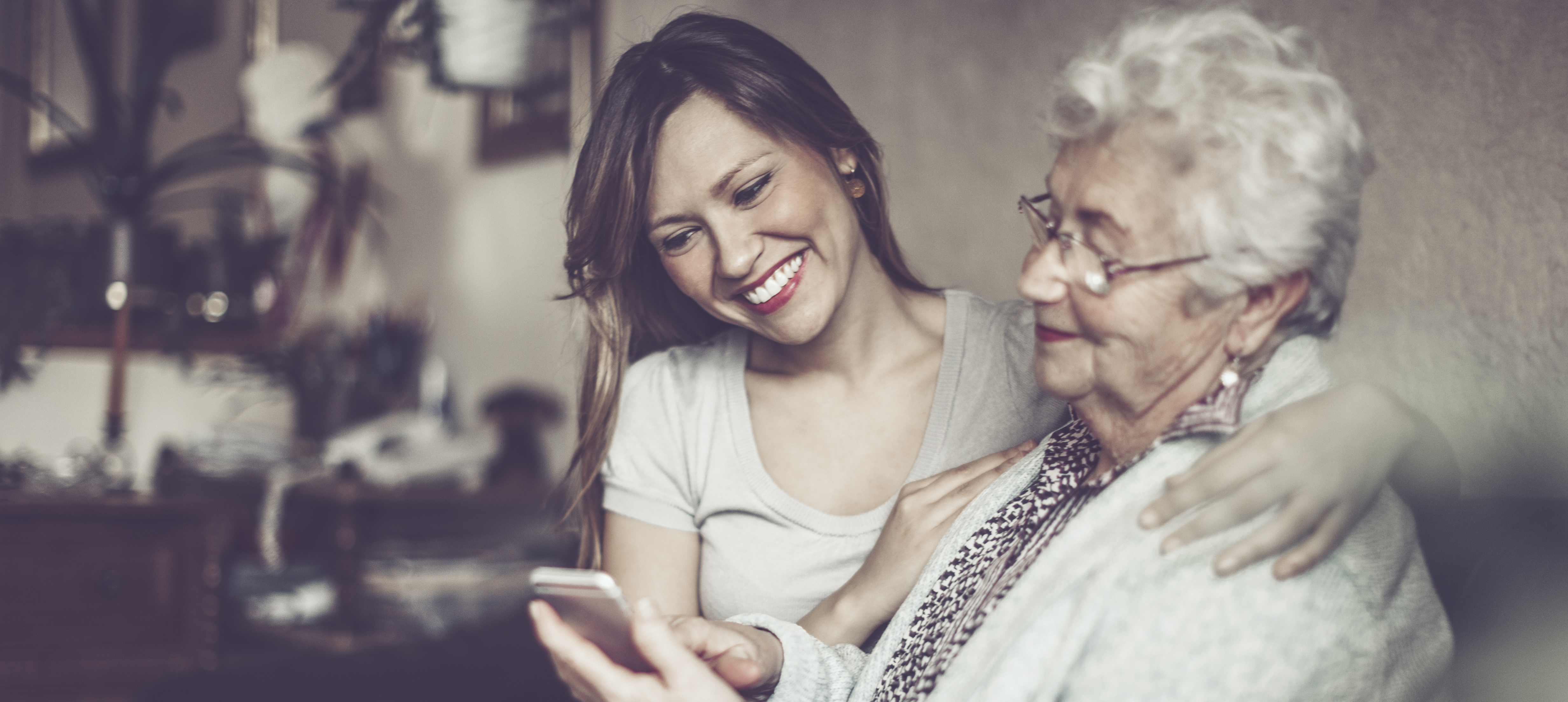 Woman reading grandmothers phone